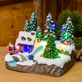 Polyresin Christmas Village, Stream with Bridge and rotating Trees, h 15 cm, with Christmas Music