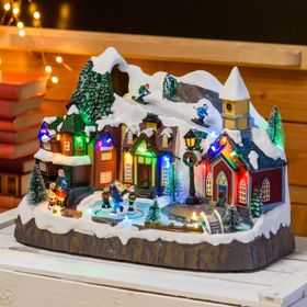 Weihnachtsdorf, mit Skifahrern und rotierenden Schlittschuhläufern, h 24 cm, mit Weihnachtsliedern