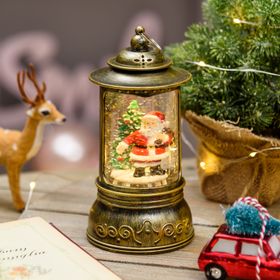 Farol cilíndrico navideño a pilas, con purpurina brillante en el agua