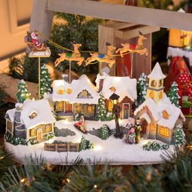 Villaggio Innevato con Chiesa e Babbo Natale su Slitta Volante con Renne in movimento, h 23 cm, musiche natalizie