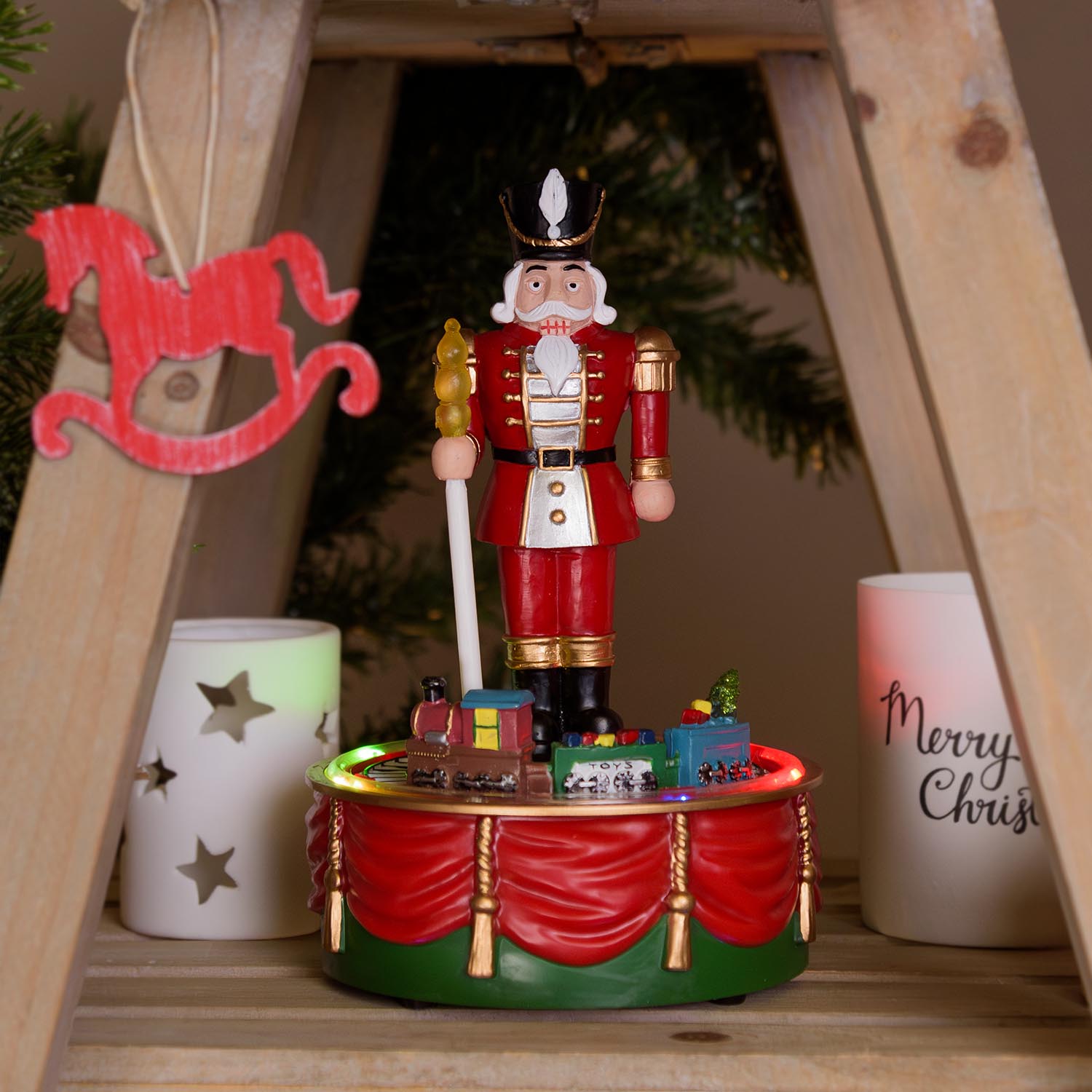 Nutcracker soldier with rotating Christmas train, h 19 cm, Christmas music Nutcracker soldier with rotating Christmas train, h 19 cm, Christmas music
