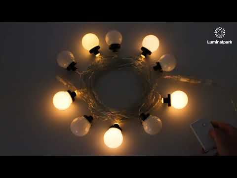 Catena 5 m, 10 sfere bianche Ø 50 mm, led bianco caldo, cavo trasparente, prolungabile 2 Catena 5 m, 10 sfere bianche Ø 50 mm, led bianco caldo, cavo trasparente, prolungabile 2