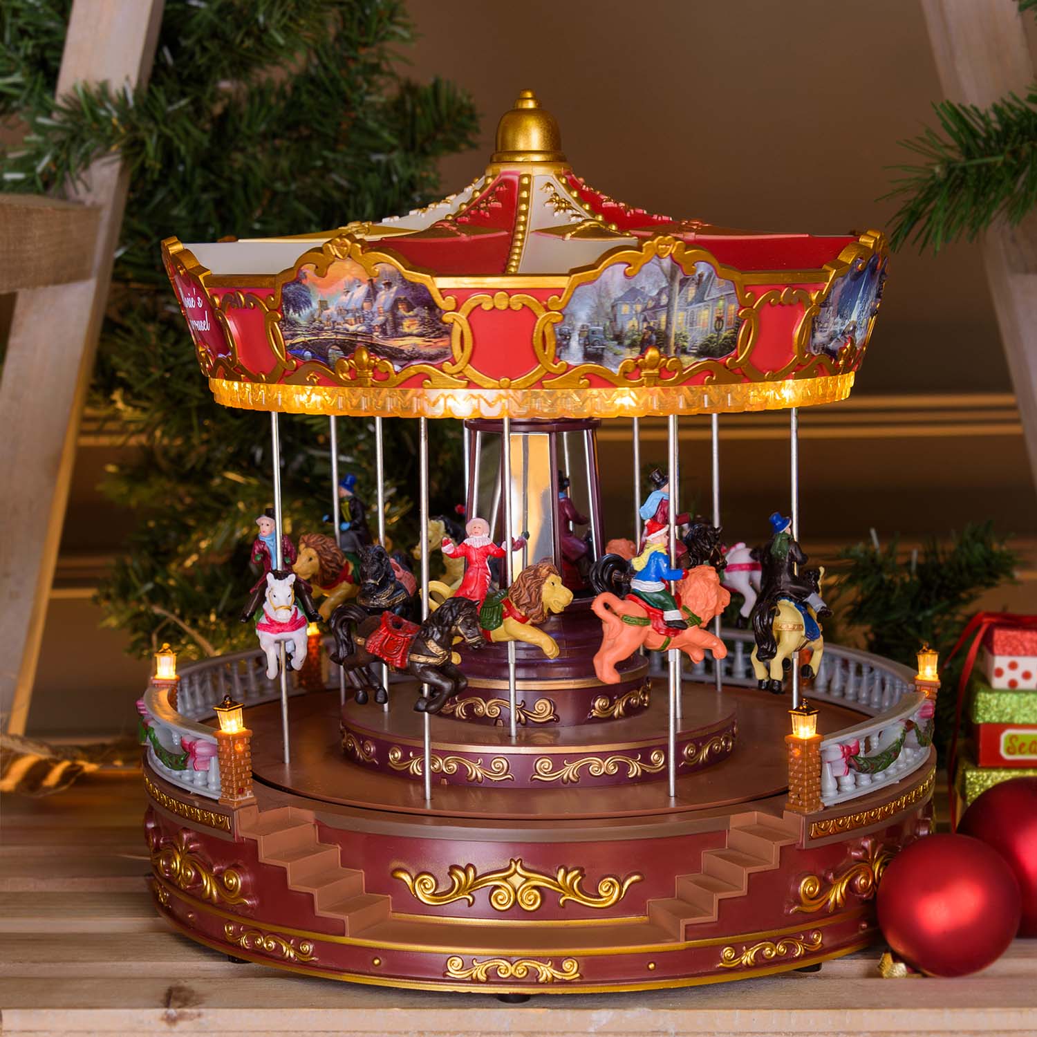 Christmas Village, Rotating merry-go-round with vertically moving horses, h. 31 cm, Christmas music Christmas Village, Rotating merry-go-round with vertically moving horses, h. 31 cm, Christmas music