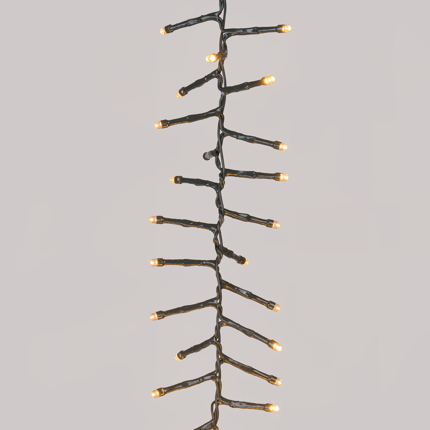 Hängende Clusterbänder Connect+ 4 m, 400 warmweiße LEDs, grünes Kabel 4 Hängende Clusterbänder Connect+ 4 m, 400 warmweiße LEDs, grünes Kabel 4