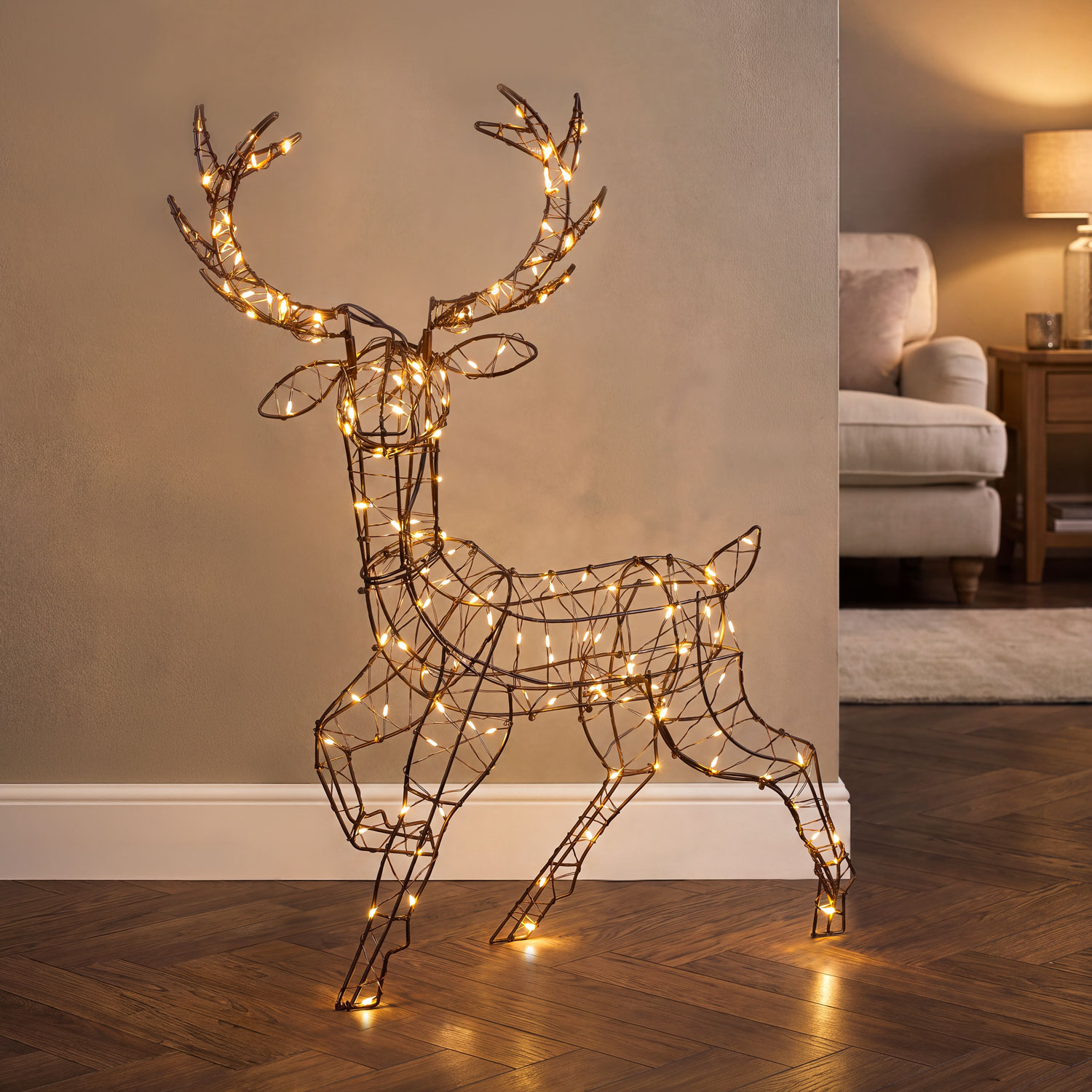 3D Brown Reindeer with raised leg, 52 cm high, 150 warm white MicroLEDs, brown metal wire, for indoor use