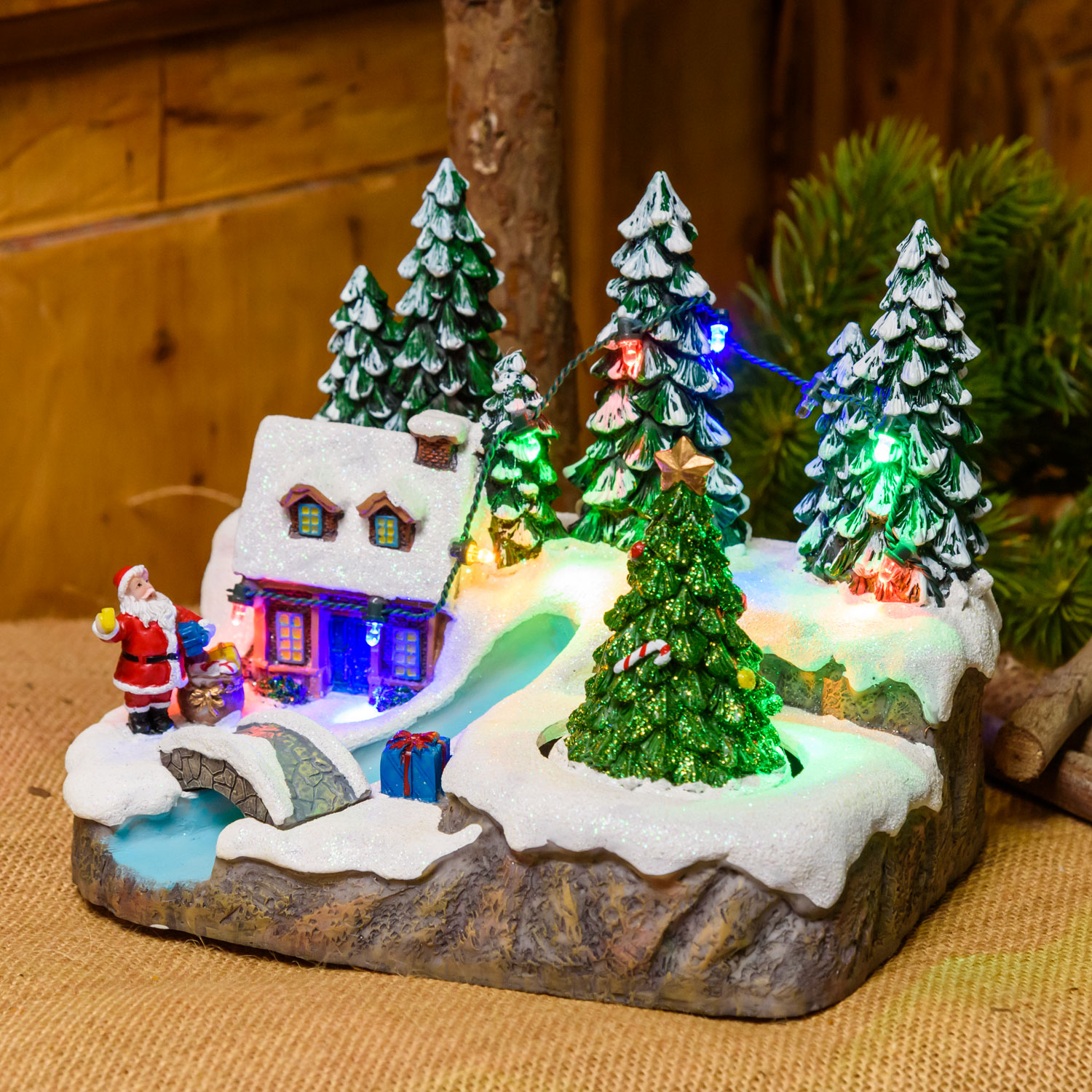 Polyresin Christmas Village, Stream with Bridge and rotating Trees, h 15 cm, with Christmas Music Polyresin Christmas Village, Stream with Bridge and rotating Trees, h 15 cm, with Christmas Music