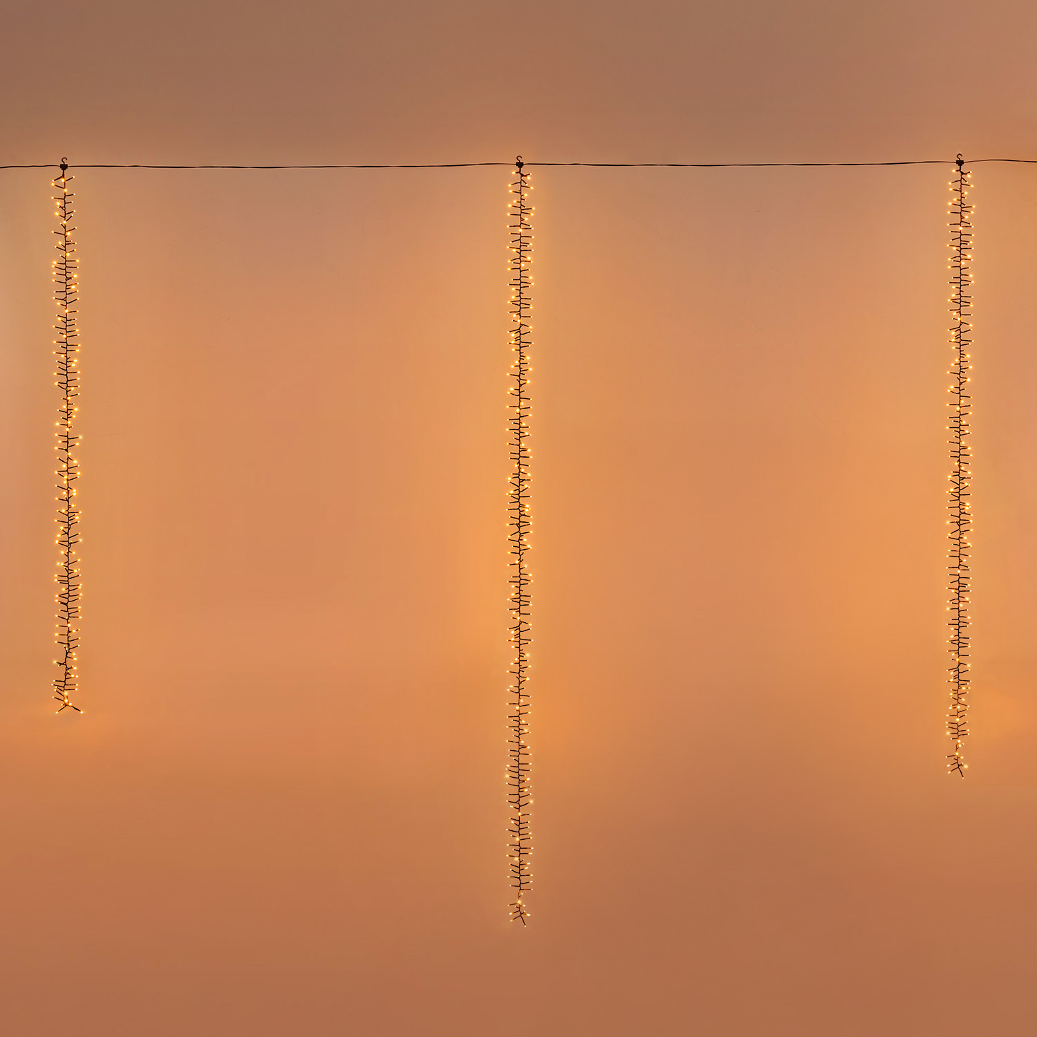 Cascata di luci Connect+ 3 nastri, 600 led bianco caldo, cavo verde, prolungabile 3