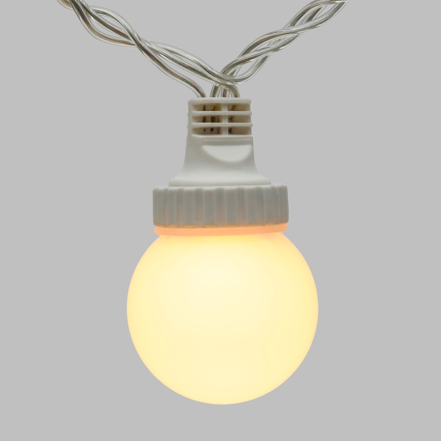 Catena 5 m, 10 sfere bianche Ø 50 mm, led bianco caldo, cavo trasparente, prolungabile 5 Catena 5 m, 10 sfere bianche Ø 50 mm, led bianco caldo, cavo trasparente, prolungabile 5