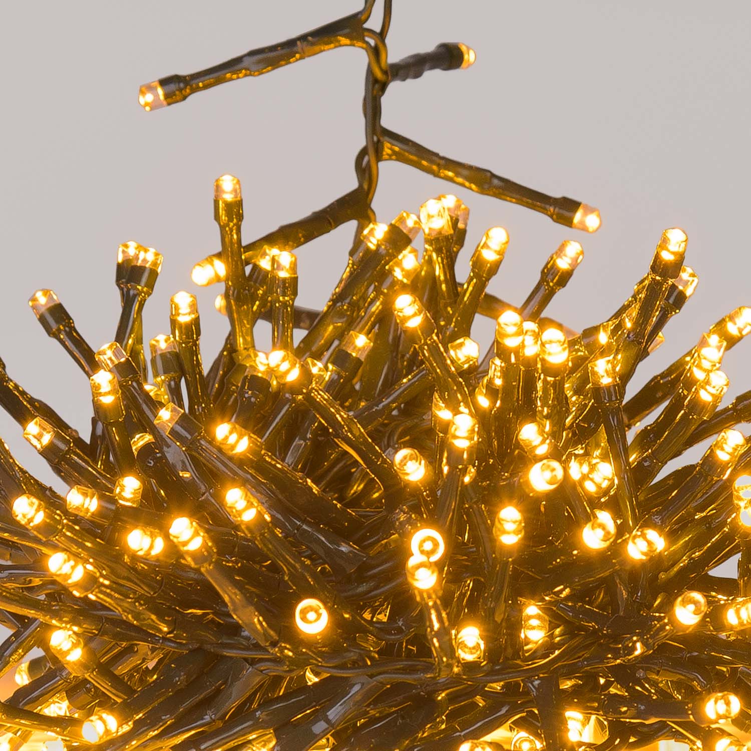 Hängende Clusterbänder Connect+ 4 m, 400 warmweiße LEDs, grünes Kabel 5 Hängende Clusterbänder Connect+ 4 m, 400 warmweiße LEDs, grünes Kabel 5