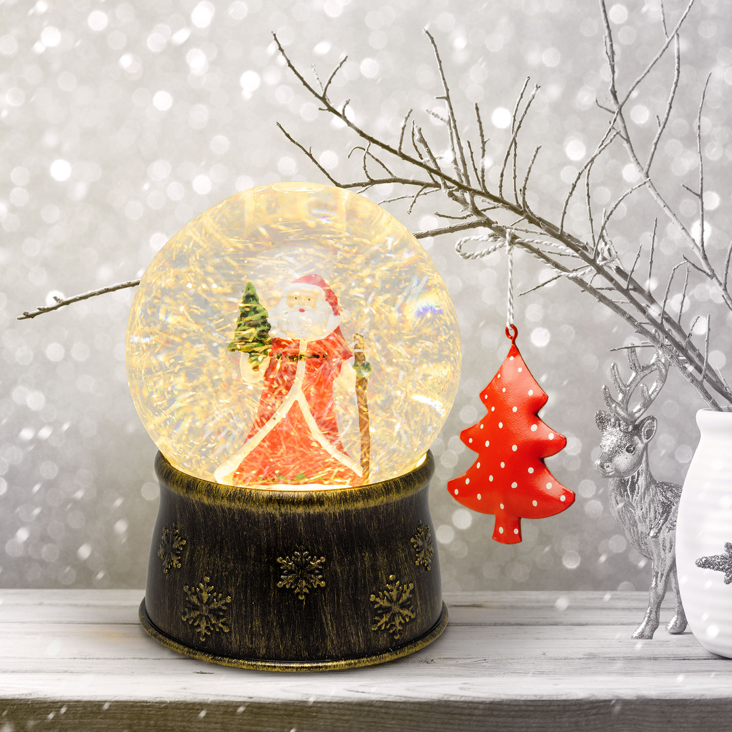 Sfera in vetro con base brunita a batteria con nevicata e Babbo Natale, h. 17 cm, led bianco caldo 7 Sfera in vetro con base brunita a batteria con nevicata e Babbo Natale, h. 17 cm, led bianco caldo 7