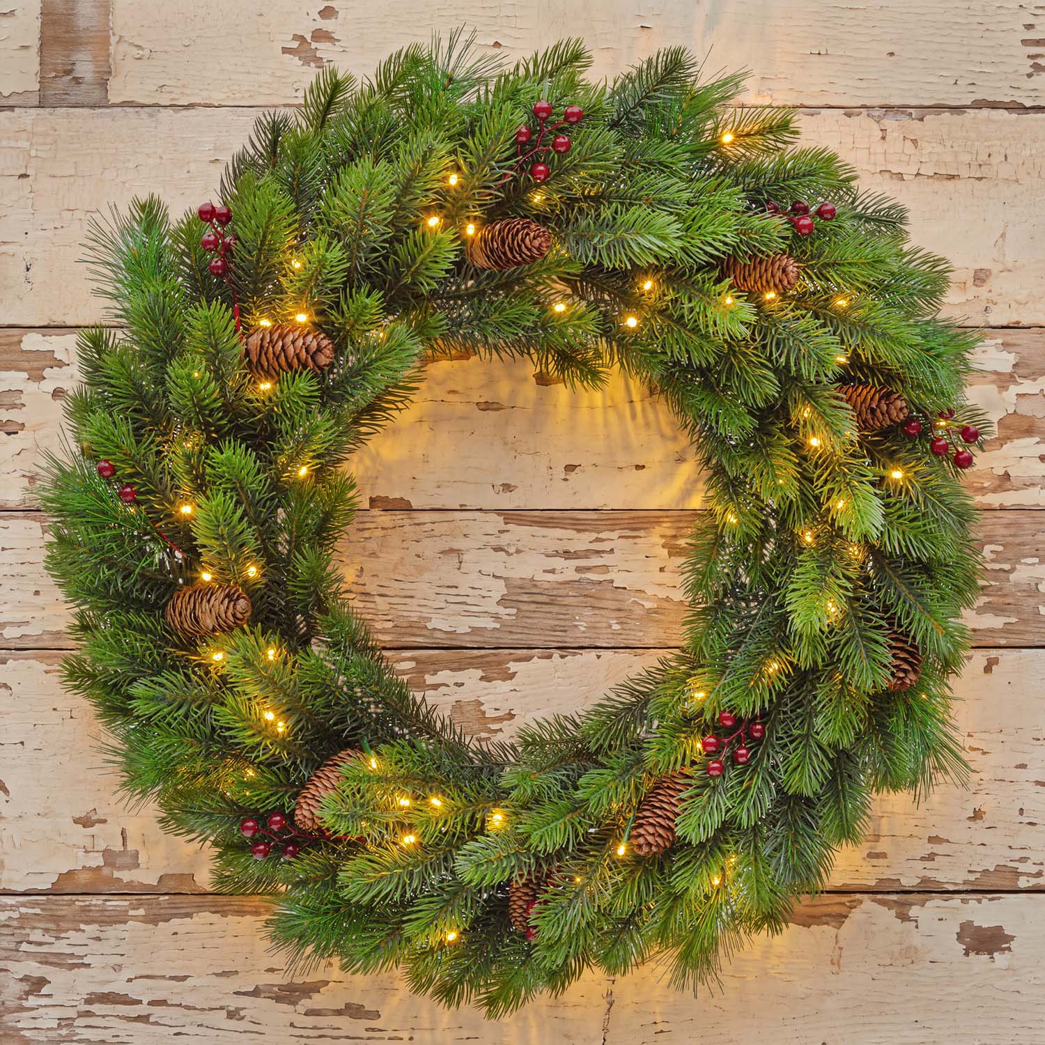 Couronne Alpino de sapin artificiel à piles, Ø 60 cm, avec pommes de pin et baies, 80 led blanc chaud intégrés