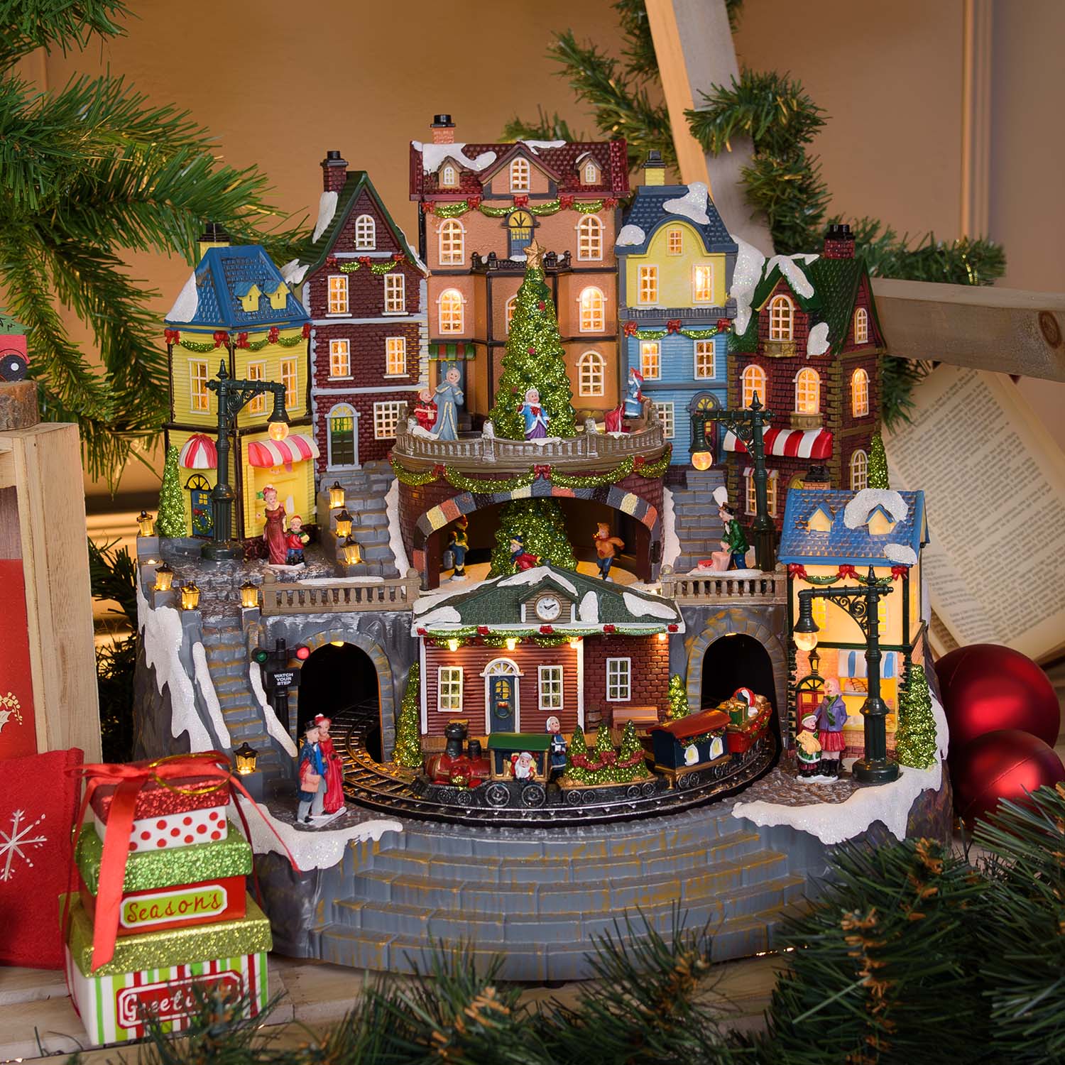 Christmas village, Station with moving train and rotating christmas tree, h 38cm, Christmas Musics Christmas village, Station with moving train and rotating christmas tree, h 38cm, Christmas Musics