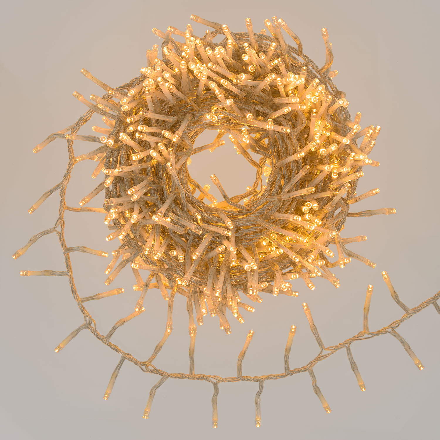 Catena Nastro di luci Connect+ 12 m, 600 led bianco caldo, cavo trasparente, prolungabile