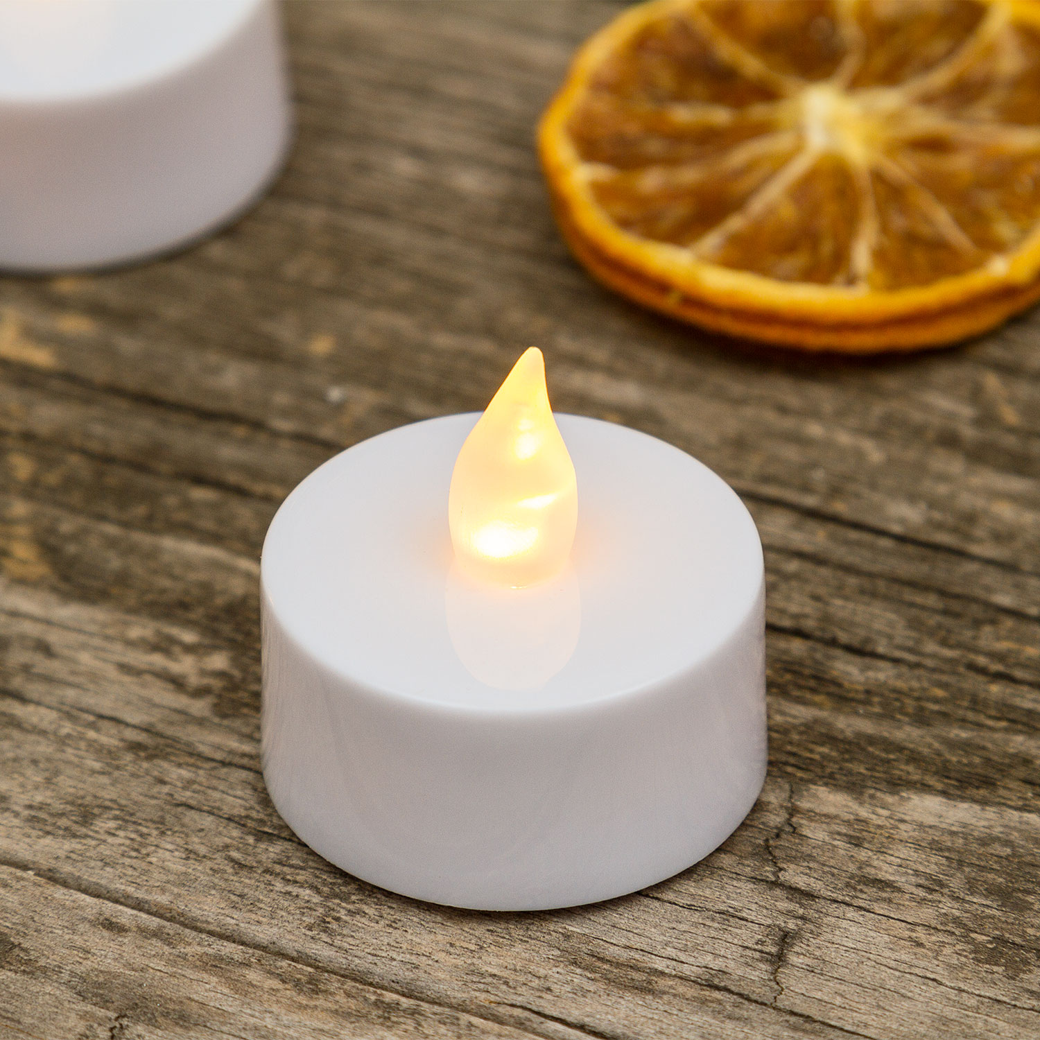 8 LED-Teelichter mit Batterie, warmweiß 9 8 LED-Teelichter mit Batterie, warmweiß 9