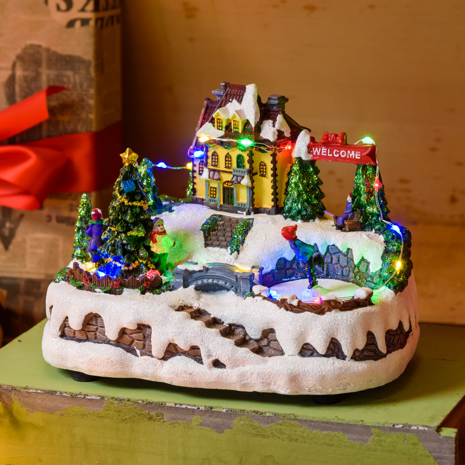 Polyresin Christmas Village, Rotating ice Skater and Christmas Tree with Kids, h 15 cm, with Christmas Music Polyresin Christmas Village, Rotating ice Skater and Christmas Tree with Kids, h 15 cm, with Christmas Music