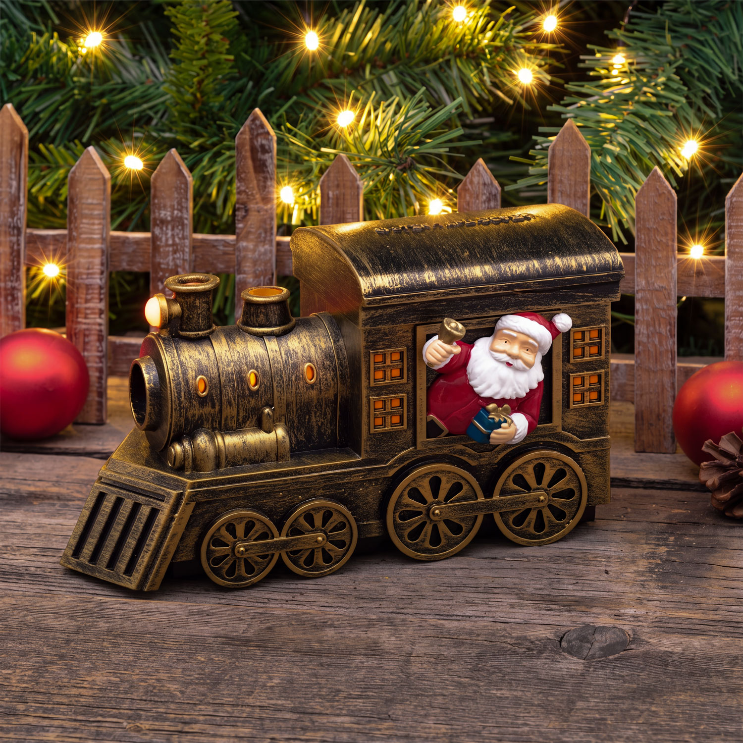 Train de Noël à piles avec diffuseur d’arômes et sons de sifflet à vapeur, h 13 cm, LED blanc chaud et multicolore