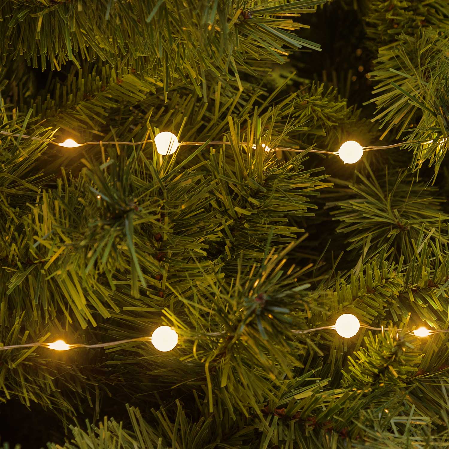 Lichterkette 10 m, 100 Mini-Gummi-Kugeln Ø 10 mm, Micro-LEDs warmweiß, Silber-Metallkabel