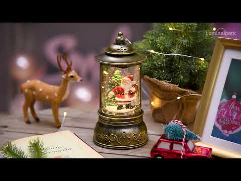 Farol cilíndrico navideño a pilas, con purpurina brillante en el agua 2 Farol cilíndrico navideño a pilas, con purpurina brillante en el agua 2