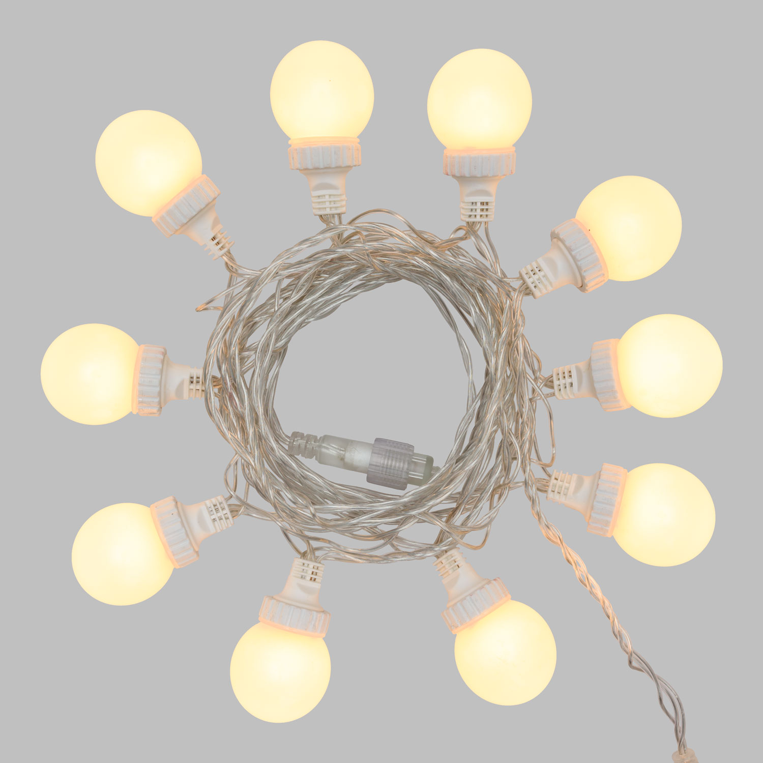 Catena 5 m, 10 sfere bianche Ø 50 mm, led bianco caldo, cavo trasparente, prolungabile 4 Catena 5 m, 10 sfere bianche Ø 50 mm, led bianco caldo, cavo trasparente, prolungabile 4