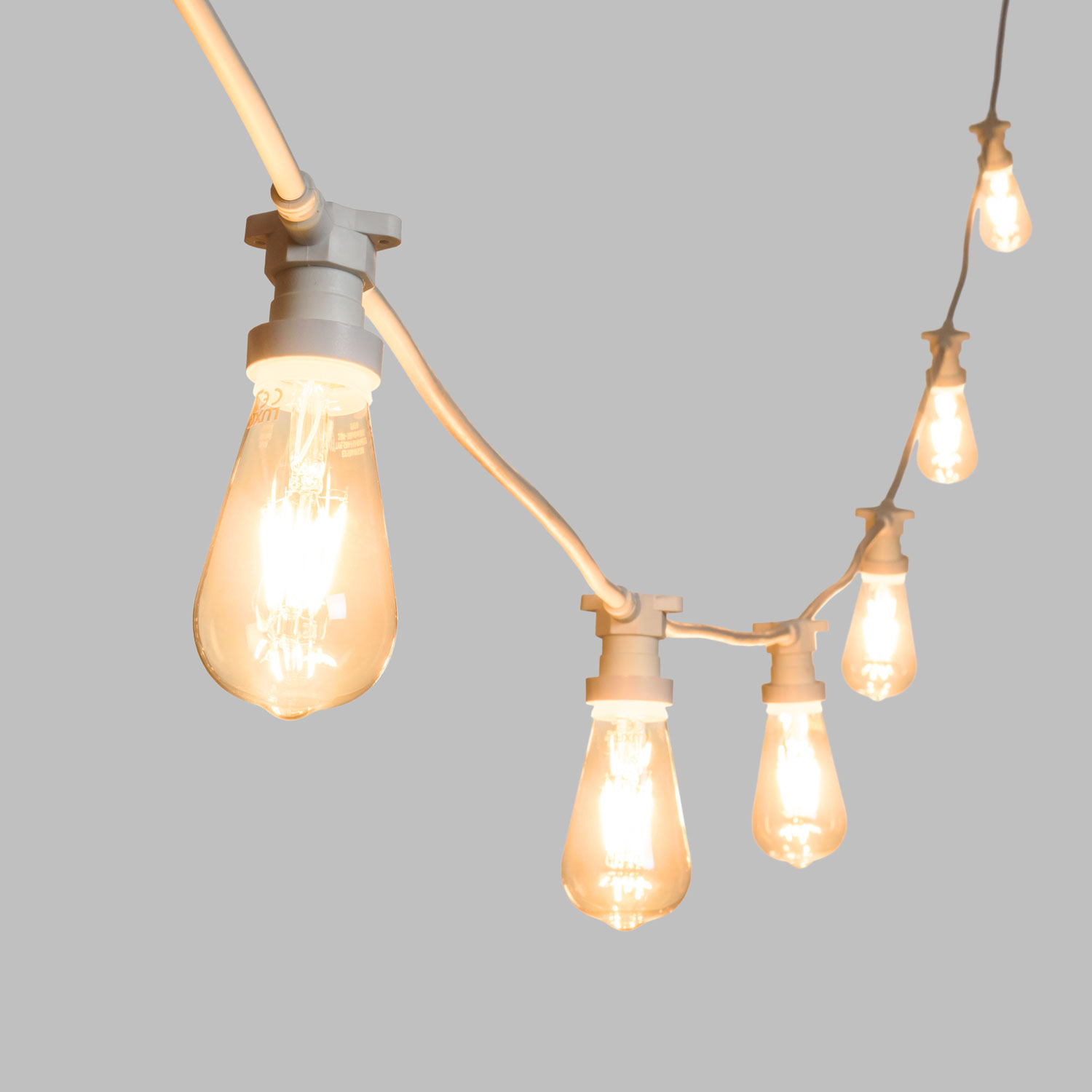 Catena 5 m, 8 lampadine led Edison Ø 64 mm di 4 Watt, cavo bianco, prolungabile 4 Catena 5 m, 8 lampadine led Edison Ø 64 mm di 4 Watt, cavo bianco, prolungabile 4