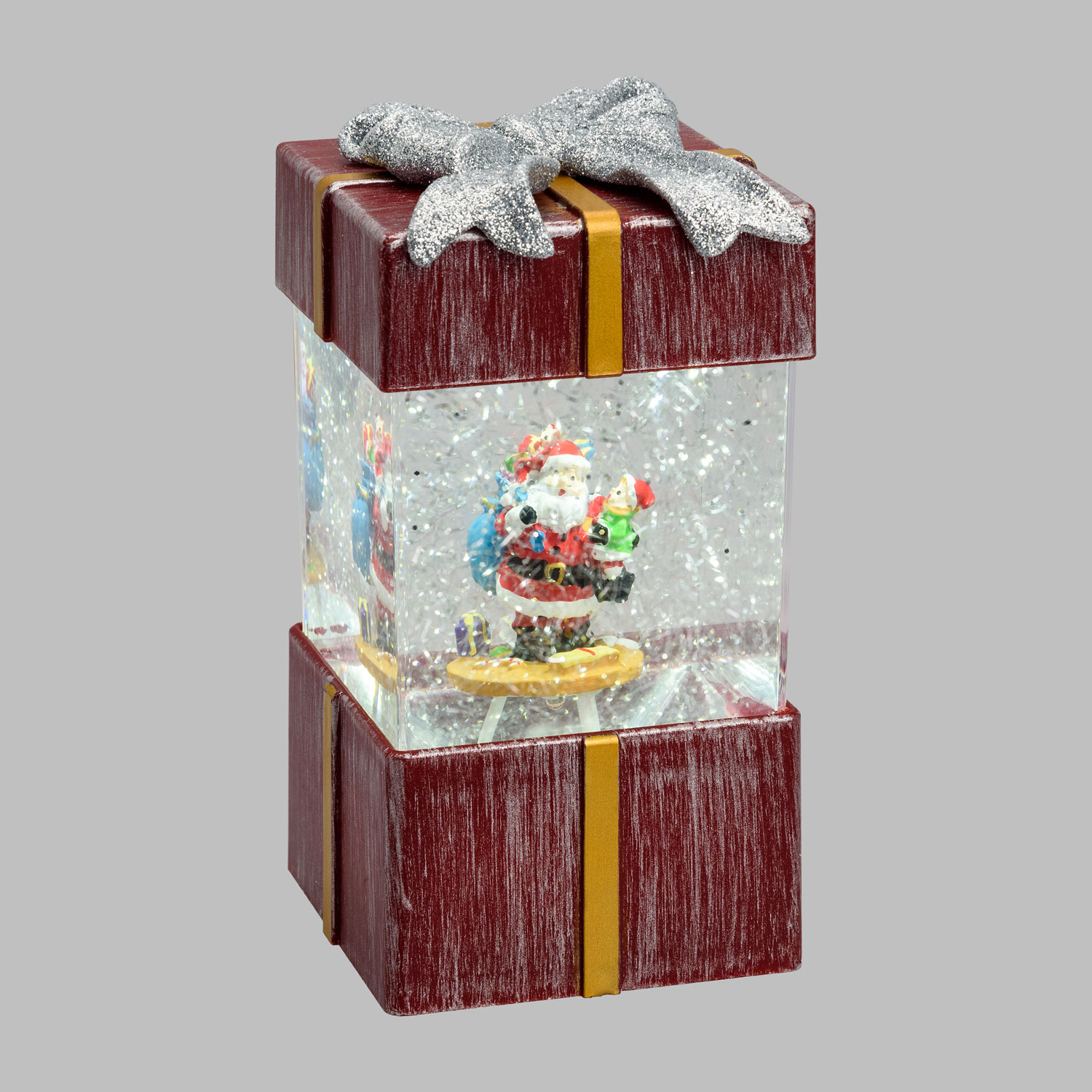 Farol navideño paquete regalo rojo antiguo con pupurina en el agua Farol navideño paquete regalo rojo antiguo con pupurina en el agua