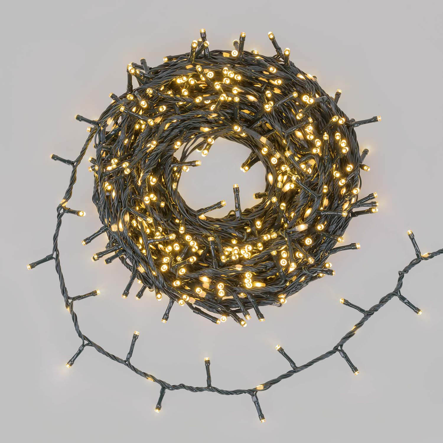 Lichterkette „Cluster StarFall“ 30 m, 1660 warmweiße LEDs, grünes Kabel