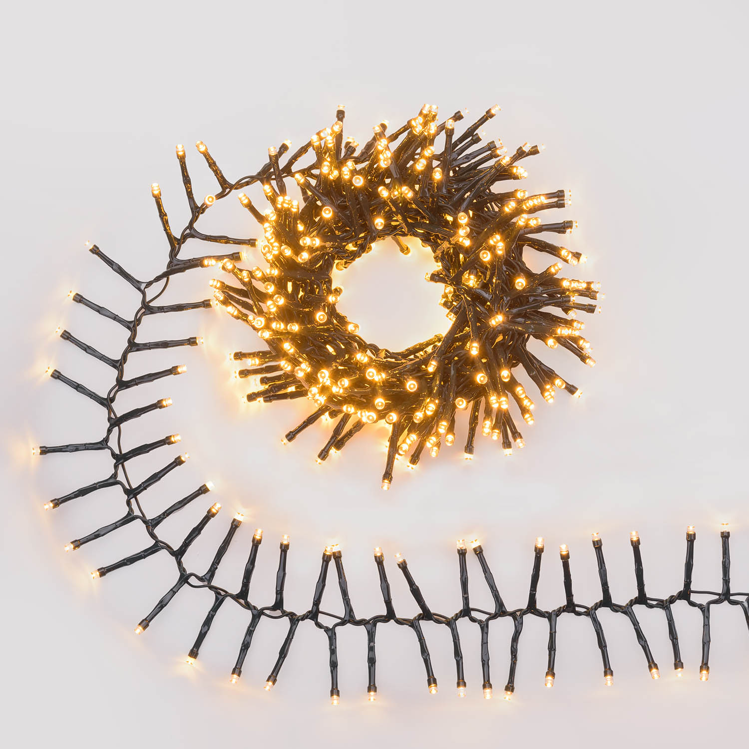 Hängende Clusterbänder Connect+ 4 m, 400 warmweiße LEDs, grünes Kabel 2 Hängende Clusterbänder Connect+ 4 m, 400 warmweiße LEDs, grünes Kabel 2