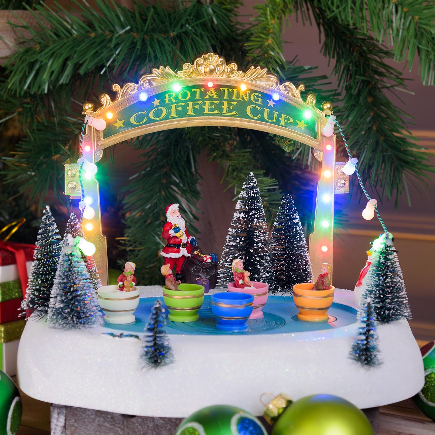 Christmas Village with Snowy Landscape Luna Park with Rotating Moving Cups, h 20 cm, Christmas music Christmas Village with Snowy Landscape Luna Park with Rotating Moving Cups, h 20 cm, Christmas music