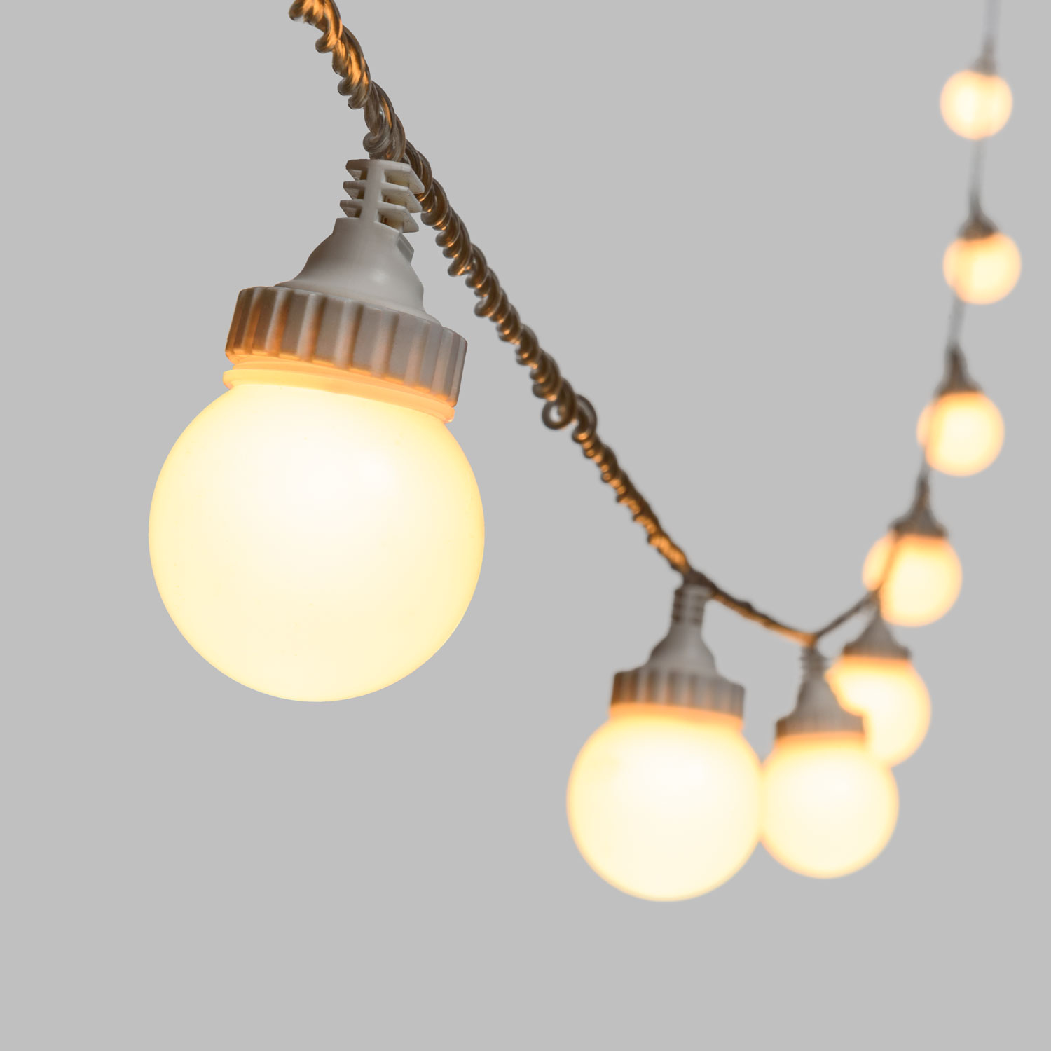 Catena 5 m, 10 sfere bianche Ø 50 mm, led bianco caldo, cavo trasparente, prolungabile 3 Catena 5 m, 10 sfere bianche Ø 50 mm, led bianco caldo, cavo trasparente, prolungabile 3