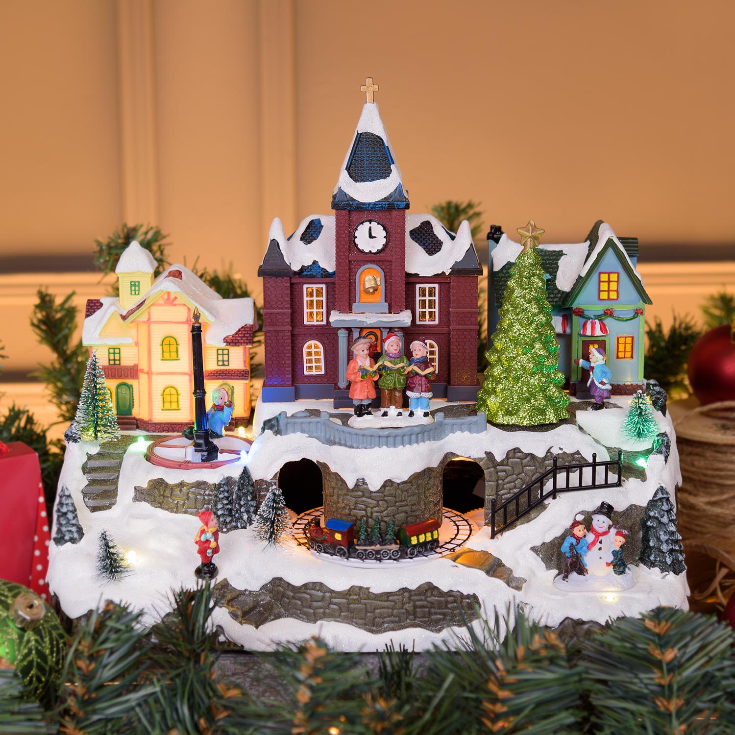 Snowy Village with Church and Train, Rotating Children's Tree and Carousel, h 27 cm, Christmas music Snowy Village with Church and Train, Rotating Children's Tree and Carousel, h 27 cm, Christmas music
